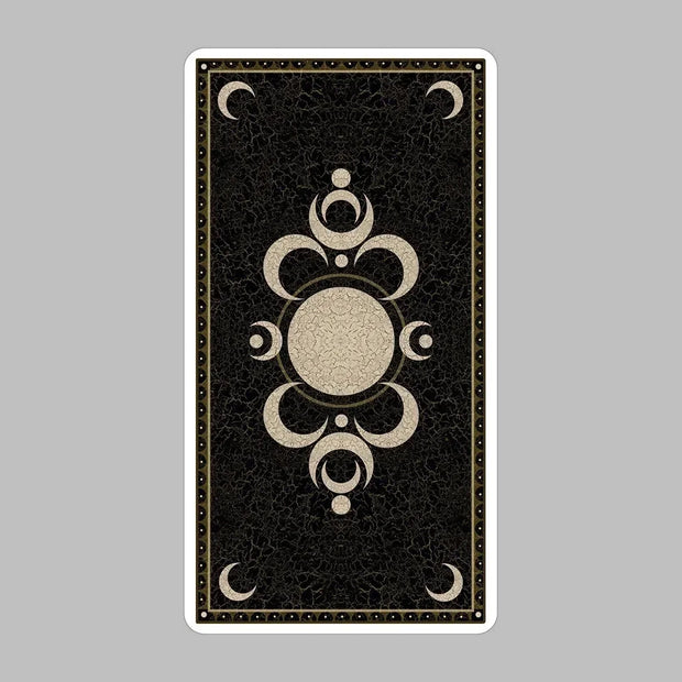 Deviant Moon Tarot Deck by Patrick Valenza showcasing unique gothic-themed tarot cards with moon-faced characters inspired by childhood dreams.  