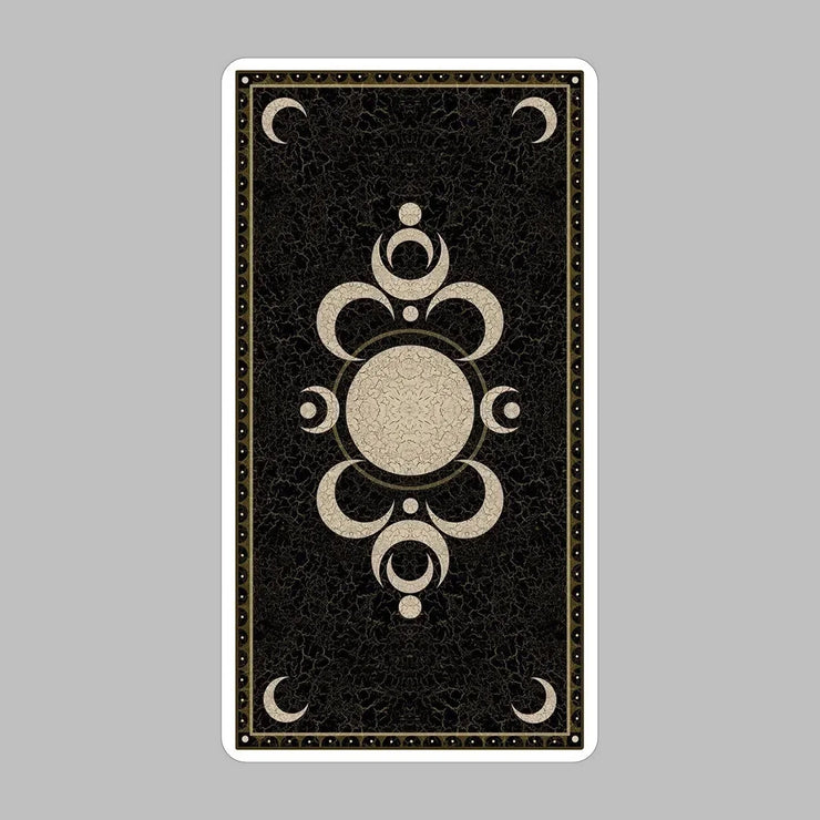 Deviant Moon Tarot Deck by Patrick Valenza showcasing unique gothic-themed tarot cards with moon-faced characters inspired by childhood dreams.  