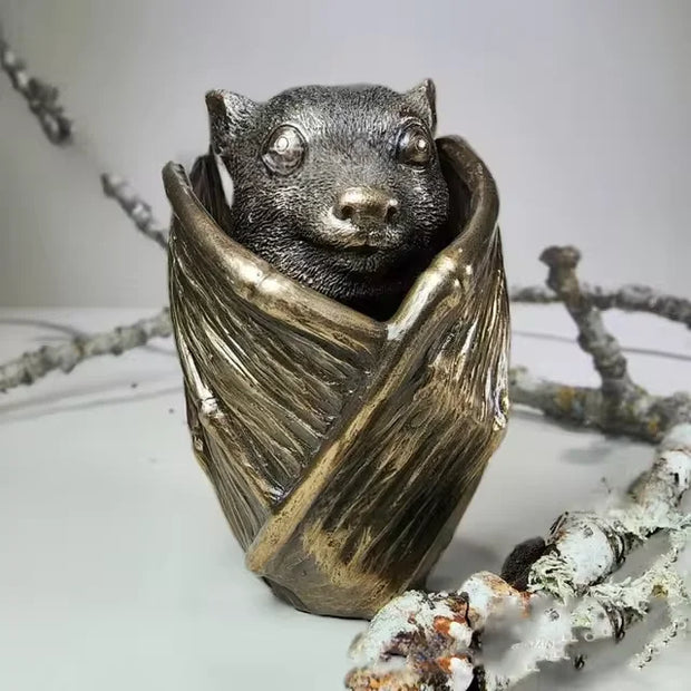 Meticulously crafted Flying Fox Bat Keepsake Stash Storage Box, hand-painted in rich bronze, 5 inches tall and 3-inch diameter, perfect for safeguarding jewelry or small treasured items, adding a touch of mystery and charm to any gothic decor.