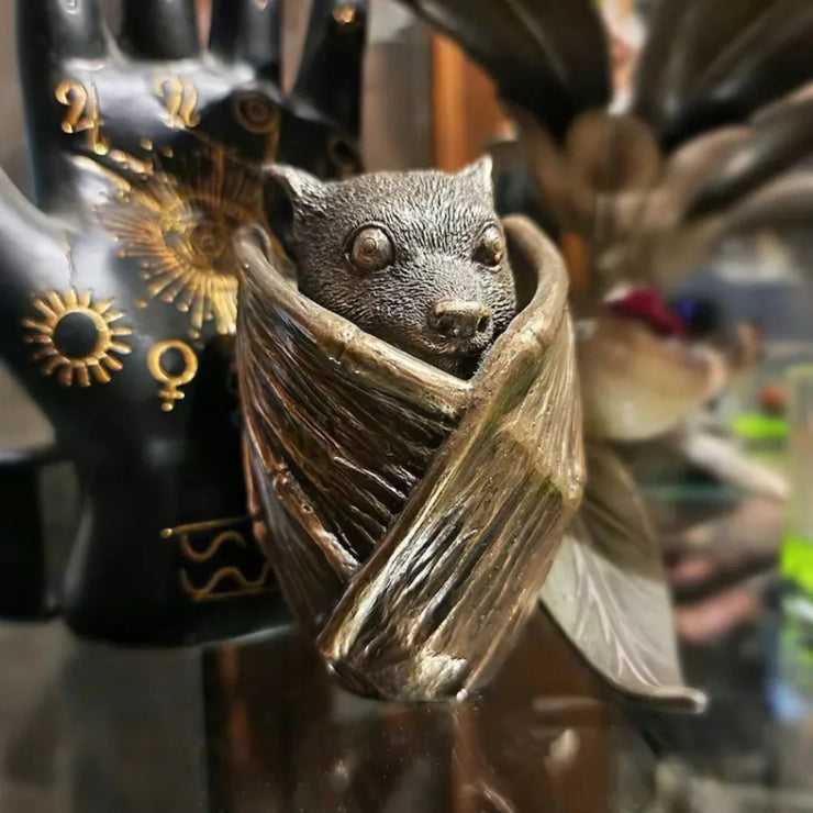 Meticulously crafted Flying Fox Bat Keepsake Stash Storage Box, hand-painted in rich bronze, 5 inches tall and 3-inch diameter, perfect for safeguarding jewelry or small treasured items, adding a touch of mystery and charm to any gothic decor.