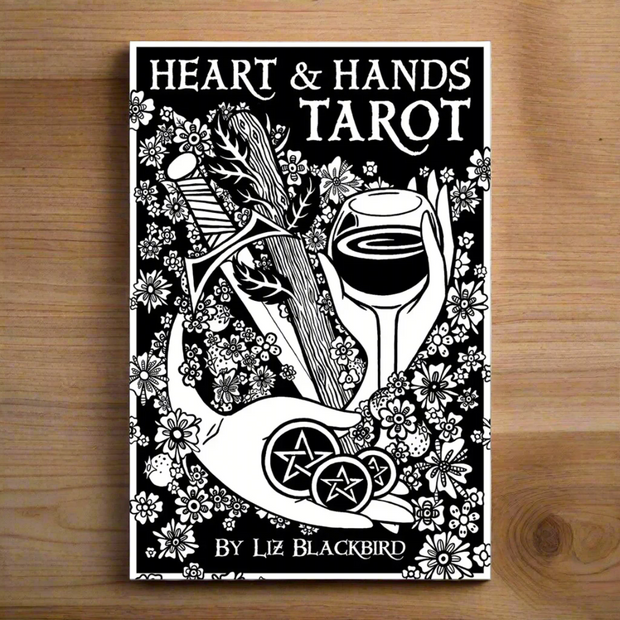 Heart & Hands Tarot Deck by Liz Blackbird, featuring flowers and figures. Intricate line-drawing technique in the 78-card black and white Tarot Deck with 72-page guidebook. Eclectic Tarot Deck rooted in Rider-Waite-Smith symbolism.