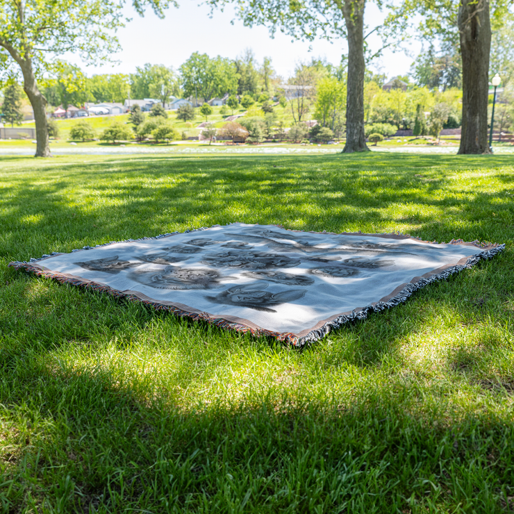 Vampire Bats Woven Throw Blanket featuring 'Chiroptera - Vampyrus' from Kunstformen der Natur by Ernst Haeckel. This beautifully crafted blanket is perfect for any setting—use it as a stunning wall decoration, a cozy throw for your sofa, or even a unique picnic spread.