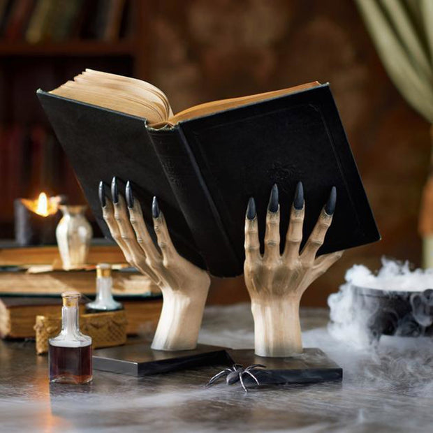 Soporte para libros de manos de bruja