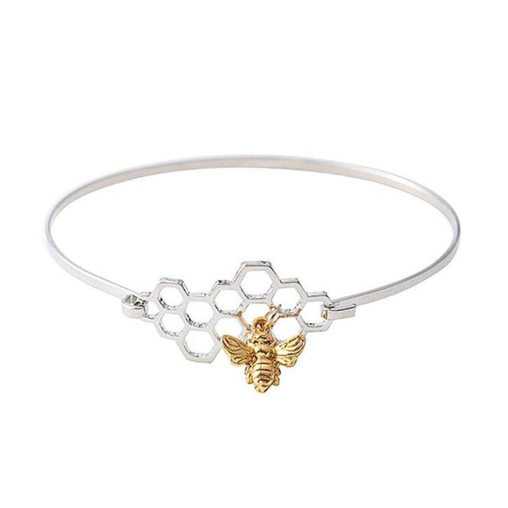 Honeycomb and Bee Silver Bangle Bracelet with Gold Charm on White Background - Unique Gift for Bee Lovers