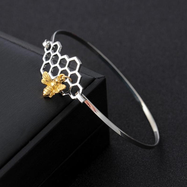 Honeycomb and Bee Silver Bangle Bracelet with Gold Charm on Black Fabric - Unique Gift for Bee Lovers